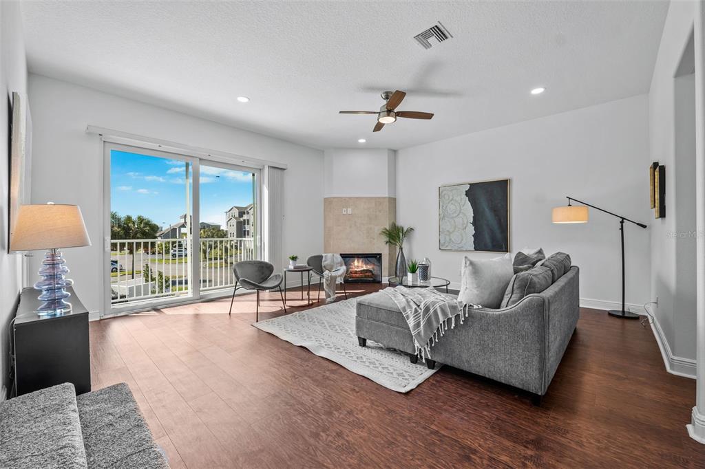 5730 Biscayne Court, Unit 6 New Port Richey, FL 34652 - Photo 3 of 55 a living room with furniture and a large window