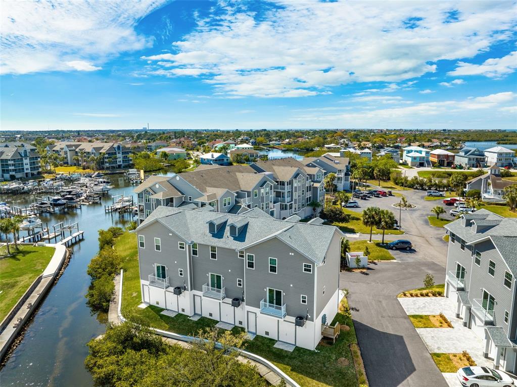 5730 Biscayne Court, Unit 6 New Port Richey, FL 34652 - Photo 31 of 55 an aerial view of residential houses with outdoor space