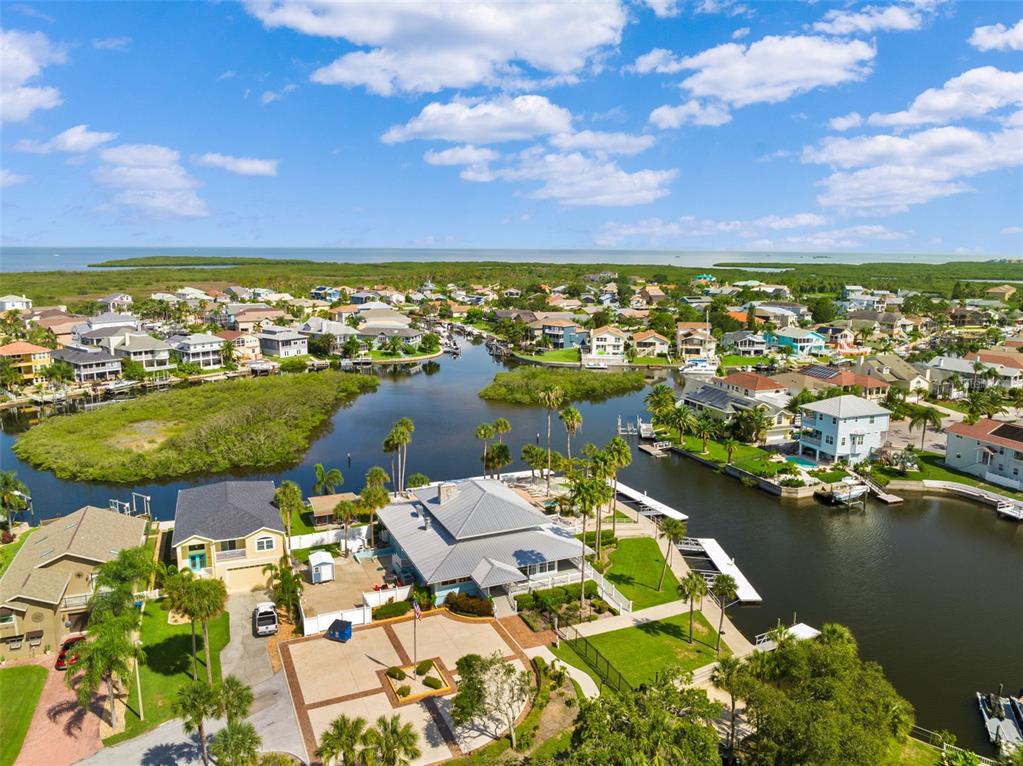 5730 Biscayne Court, Unit 6 New Port Richey, FL 34652 - Photo 32 of 55 a view of a lake with a city view