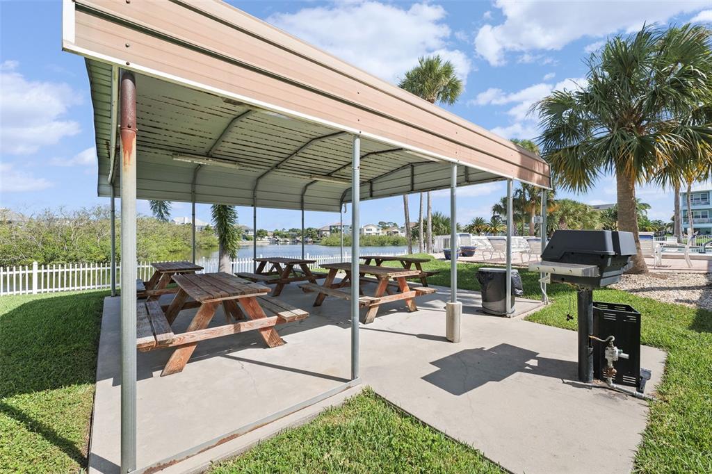 5730 Biscayne Court, Unit 6 New Port Richey, FL 34652 - Photo 44 of 55 a view of outdoor space yard deck and outdoor seating