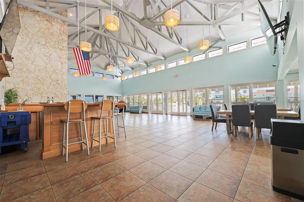 5730 Biscayne Court, Unit 6 New Port Richey, FL 34652 - Photo 46 of 55 a view of a tables and chairs in a patio