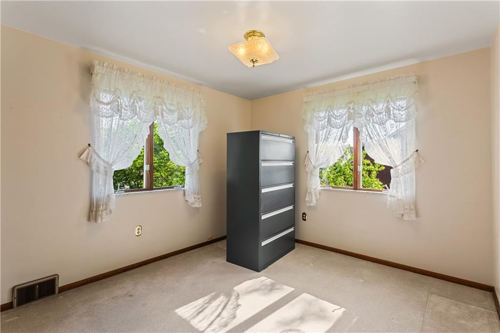 849 Falck Road McKees Rocks, PA 15136 - Photo 11 of 25 a view of a bedroom with window and closet