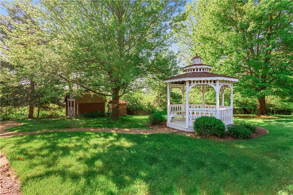 849 Falck Road McKees Rocks, PA 15136 - Photo 22 of 25 a front view of a house with garden