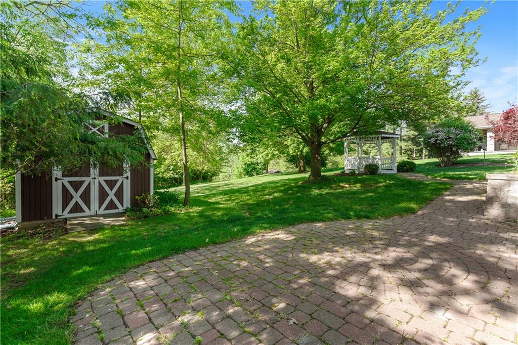 849 Falck Road McKees Rocks, PA 15136 - Photo 23 of 25 a view of a backyard with a garden