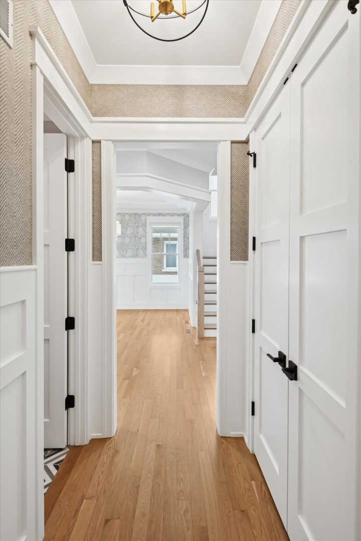 548 South Fairview Avenue Elmhurst, IL 60126 - Photo 38 of 44 a view of a hallway with wooden floor and closet