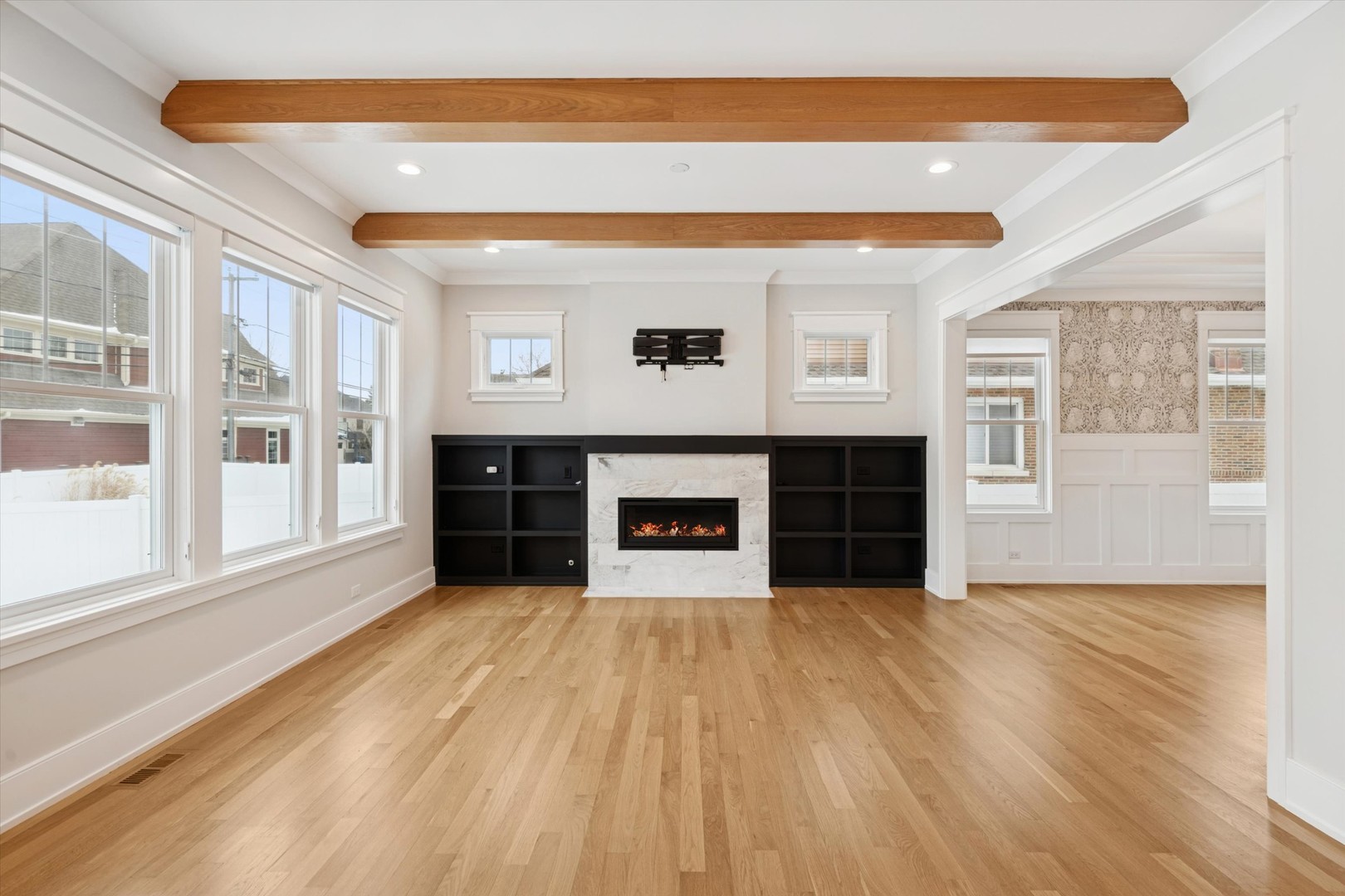 548 South Fairview Avenue Elmhurst, IL 60126 - Photo 4 of 44 a view of an empty room with wooden floor and a window