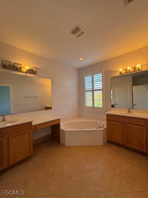 4040 Cherrybrook Loop Fort Myers, FL 33966 - Photo 11 of 18 a bathroom with sink bathtub and view