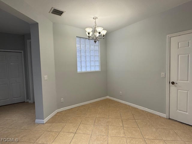4040 Cherrybrook Loop Fort Myers, FL 33966 - Photo 4 of 18 a view of an empty room with chandelier fan
