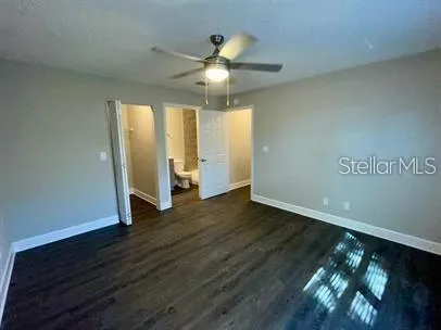 a bathroom with a bathtub and a toilet