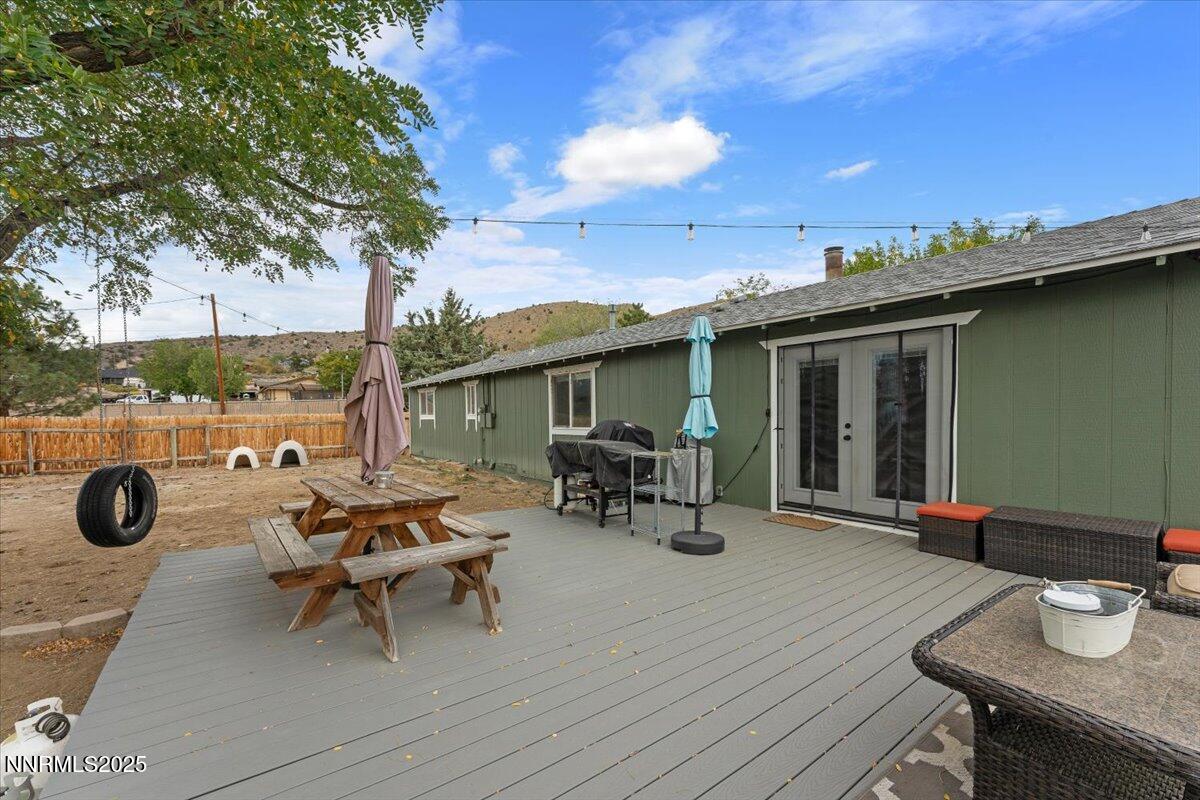 11720 Oregon Boulevard Reno, NV 89506 - Photo 19 of 45 a view of a dinning tables and chairs in patio of the house