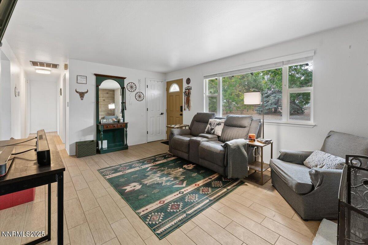 11720 Oregon Boulevard Reno, NV 89506 - Photo 4 of 45 a living room with furniture rug and window