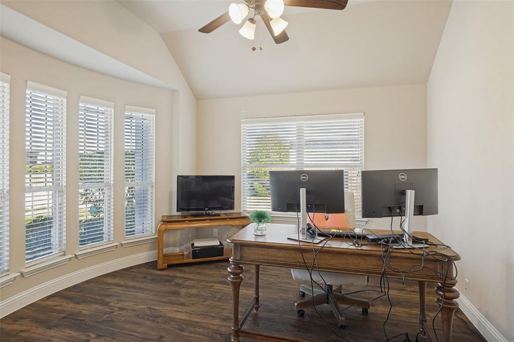 3405 Fletcher Road Heartland, TX 75114 - Photo 13 of 30 View of office off foyer. Office has French Doors, large bay window, ceiling fan, and laminate flooring.