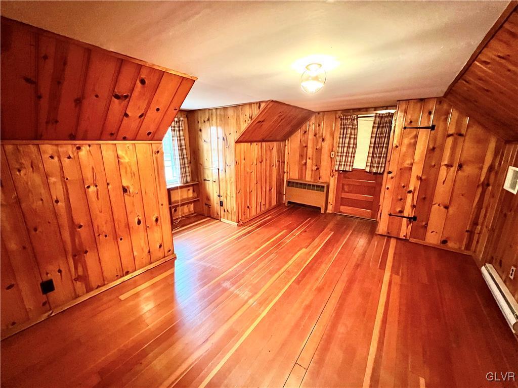 1807 Blue Barn Road Orefield, PA 18069 - Photo 13 of 18 a view of an empty room with wooden floor and a window