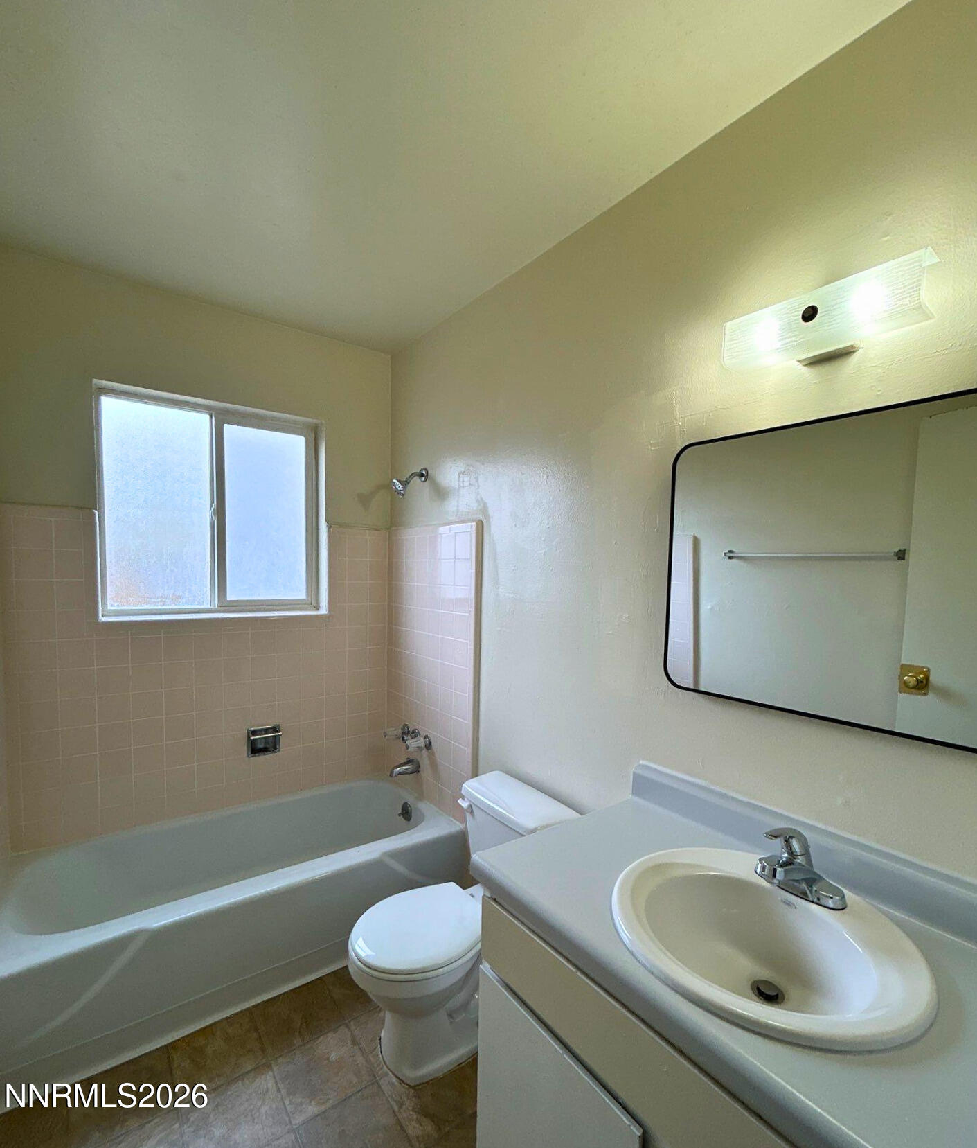 3285 Gypsum Road Reno, NV 89503 - Photo 11 of 17 a bathroom with a sink a toilet and a bathtub