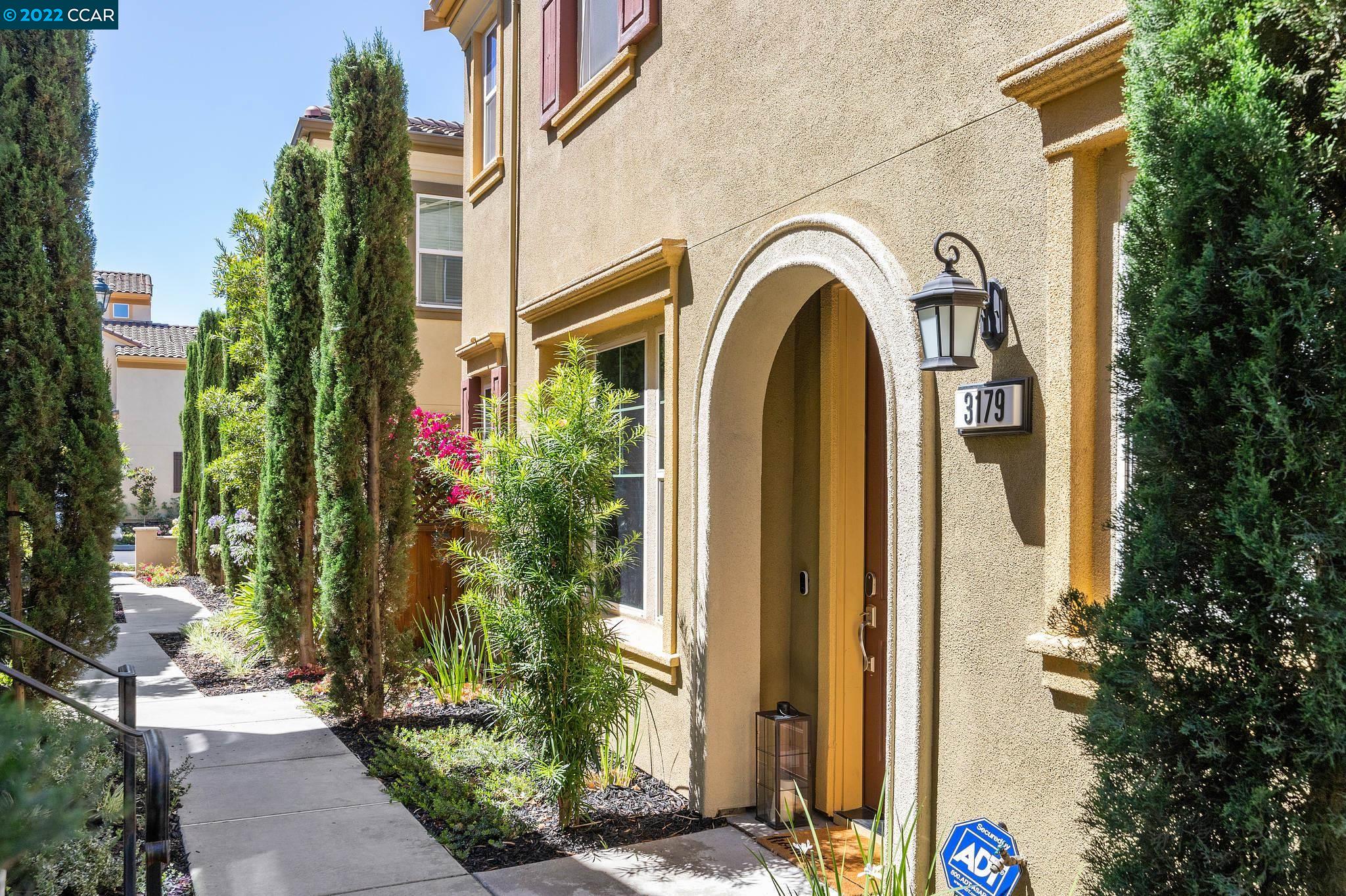 3179 Vittoria Loop Dublin, CA 94568 - Photo 1 of 1 a front view of a house with garden