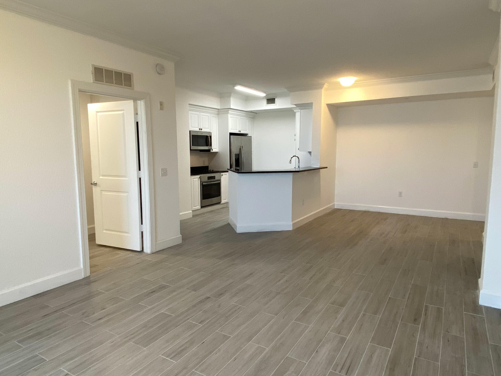 1690 Renaissance Commons Boulevard, Unit 1418 Boynton Beach, FL 33426 - Photo 4 of 21 1418_001