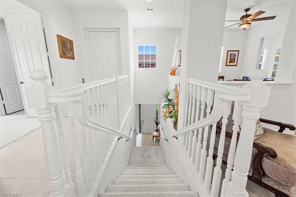 6443 Legacy Circle, Unit 1103 Naples, FL 34113 - Photo 8 of 35 a view of a livingroom with a fireplace