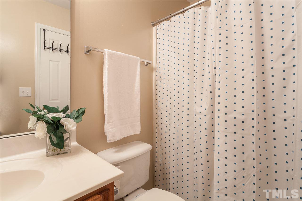 4040 Pearl Road Raleigh, NC 27610 - Photo 11 of 15 Master bath features a tub shower combo.