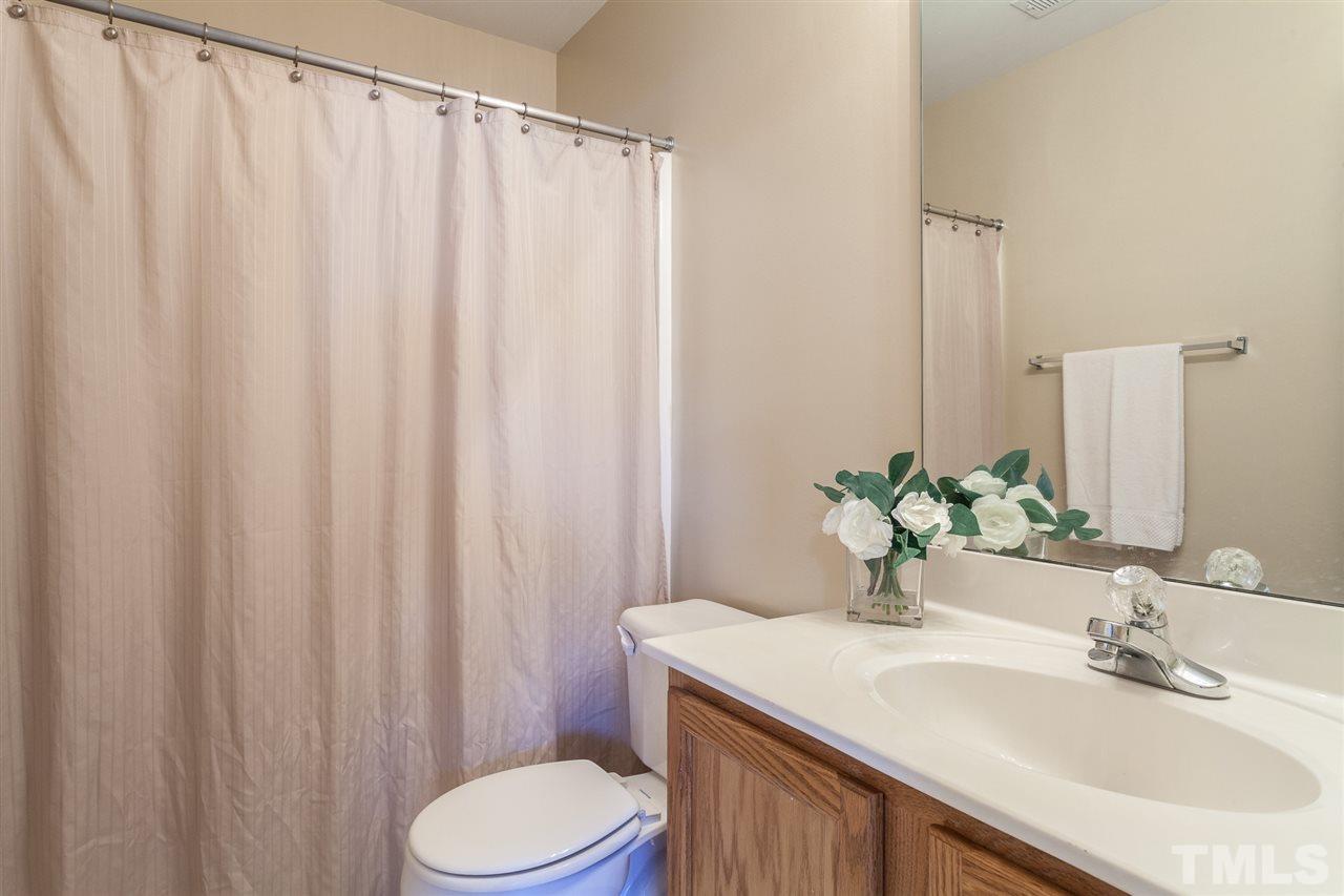 4040 Pearl Road Raleigh, NC 27610 - Photo 8 of 15 Hall bath has a tub shower combo