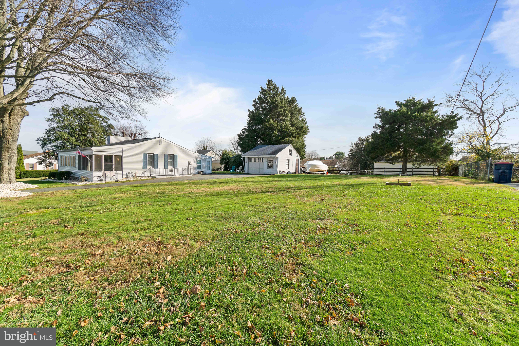 76 Bluff Road Earleville, MD 21919 - Photo 1 of 16 a view of a house with a big yard