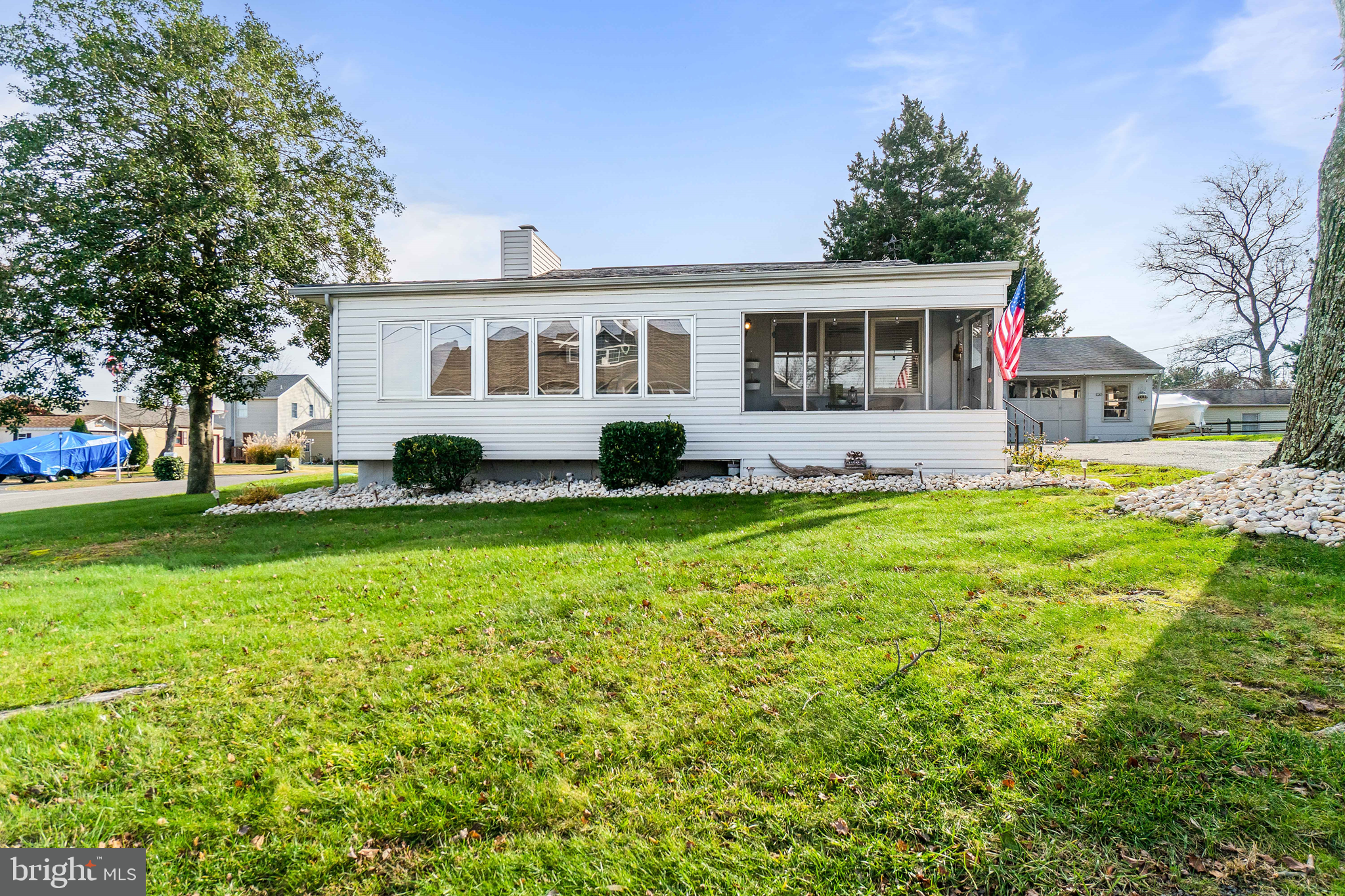76 Bluff Road Earleville, MD 21919 - Photo 2 of 16 a front view of house with yard and green space