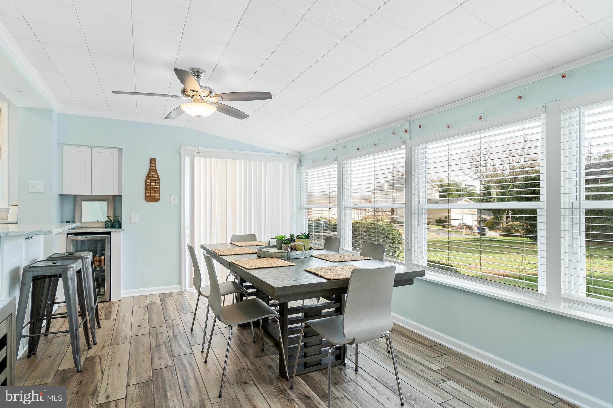 76 Bluff Road Earleville, MD 21919 - Photo 10 of 16 a view of a dining room with furniture window and wooden floor