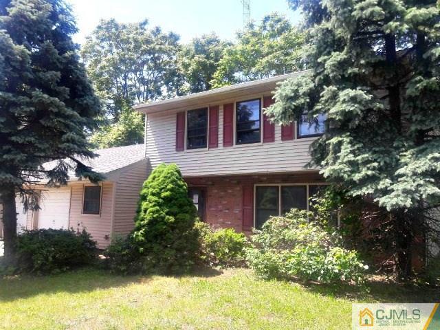 18 Ash Road Edison, NJ 08817 - Photo 3 of 25 a view of a house with a yard