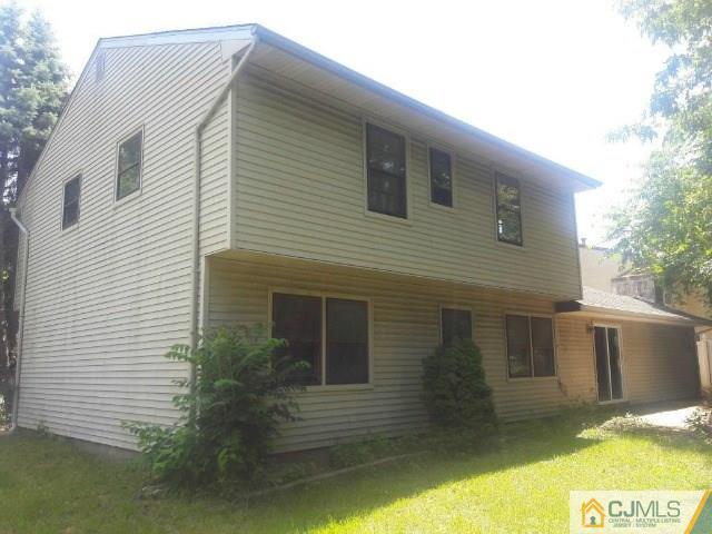 18 Ash Road Edison, NJ 08817 - Photo 21 of 25 a view of a house with a yard