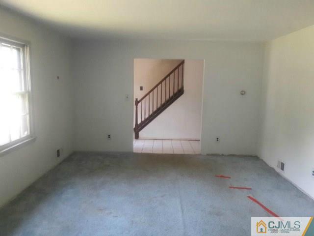 18 Ash Road Edison, NJ 08817 - Photo 5 of 25 a view of room with stairs