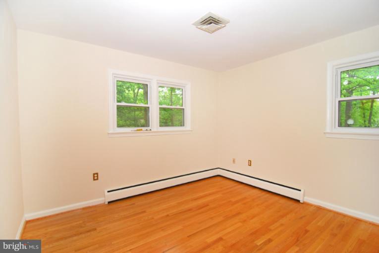 6425 Lignum Street Springfield, VA 22150 - Photo 11 of 30 an empty room with a window
