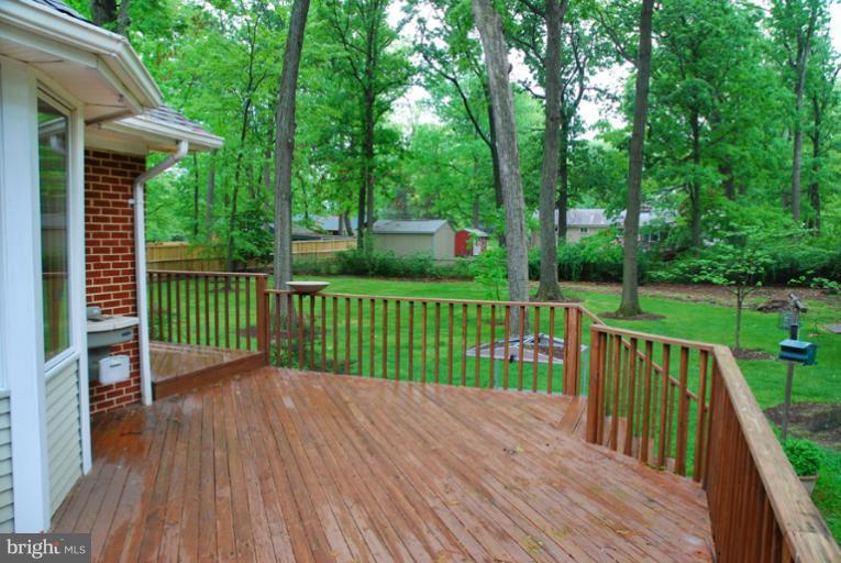 6425 Lignum Street Springfield, VA 22150 - Photo 13 of 30 a view of a deck with a large window