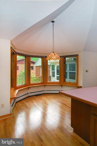 6425 Lignum Street Springfield, VA 22150 - Photo 14 of 30 a view of an empty room with a window and wooden floor