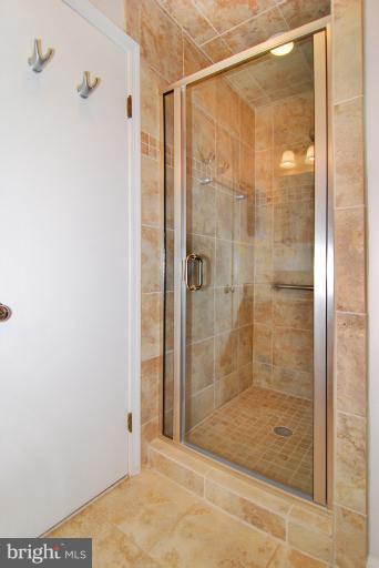 6425 Lignum Street Springfield, VA 22150 - Photo 16 of 30 a bathroom with a shower