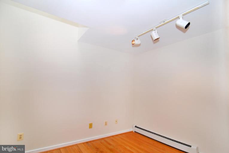 6425 Lignum Street Springfield, VA 22150 - Photo 20 of 30 a view of a room with racks on the wall