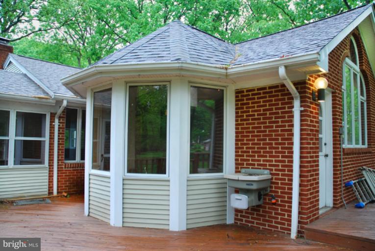 6425 Lignum Street Springfield, VA 22150 - Photo 6 of 30 a view of a house with a porch