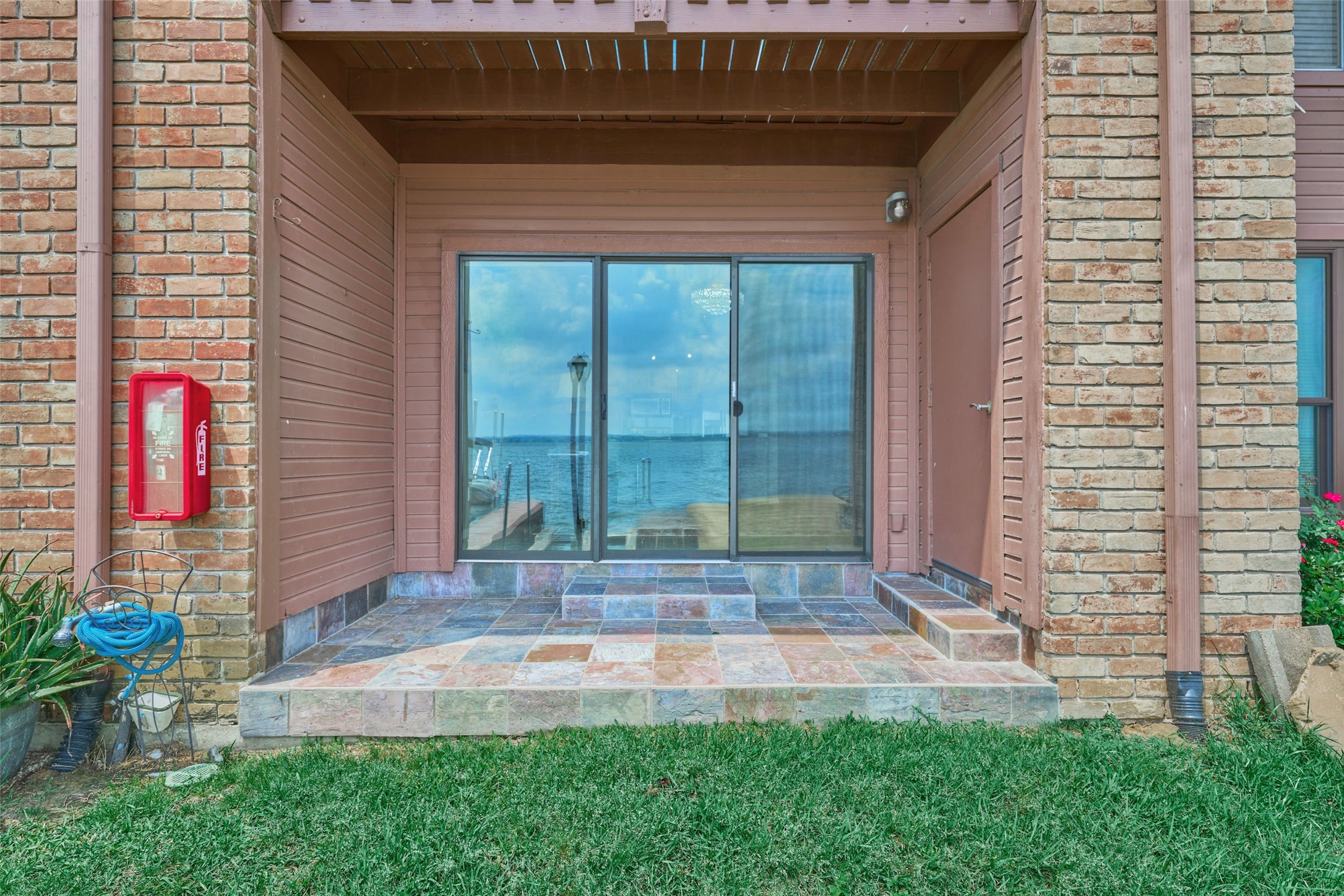 801 River Road, Unit 105D Montgomery, TX 77356 - Photo 26 of 32 Covered back patio to enjoy year round.