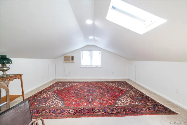 a view of a hallway with white walls