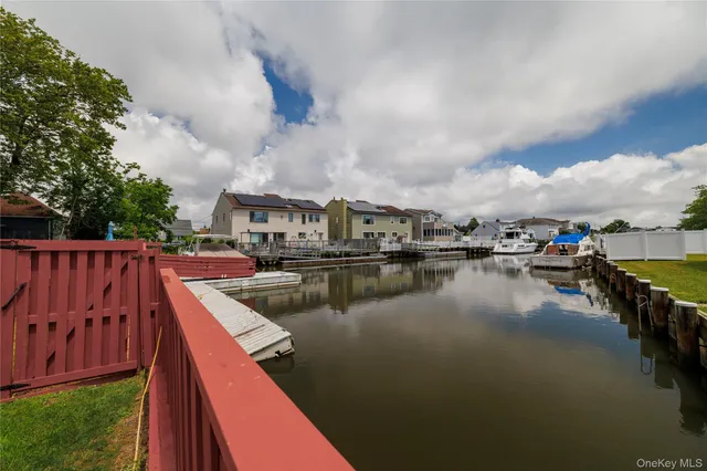 a view of swimming pool with outdoor seating