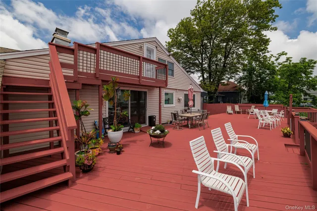 a view of swimming pool with outdoor seating
