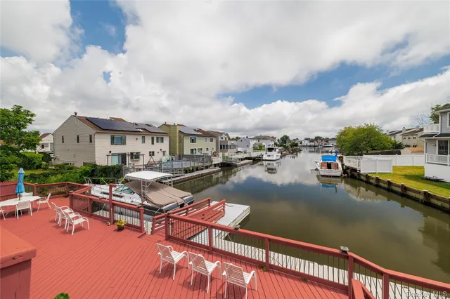 a view of swimming pool with outdoor seating