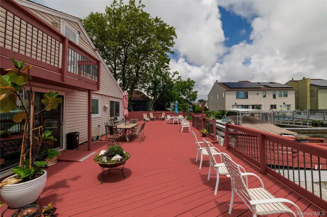 a view of a terrace with seating area and furniture