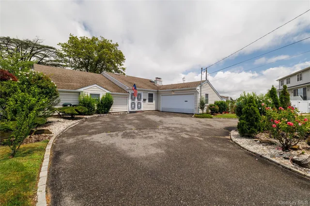 a view of a house with a street