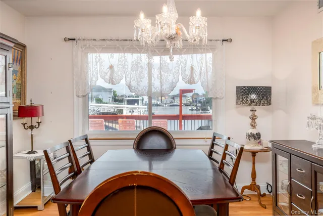a view of a livingroom with furniture and a flat screen tv