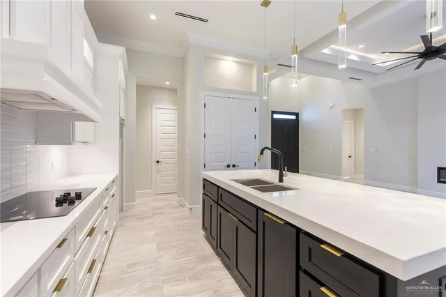 an empty room with closet and windows