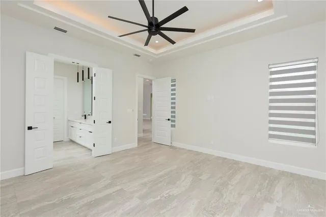 a bathroom with a granite countertop sink mirror and double