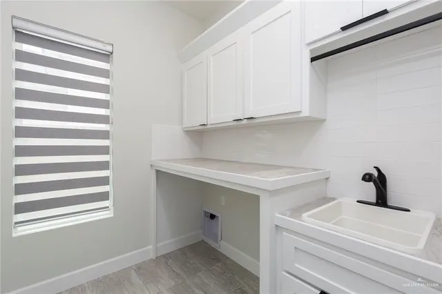 a house with garden in front of it