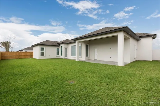 a view of a backyard with a garden