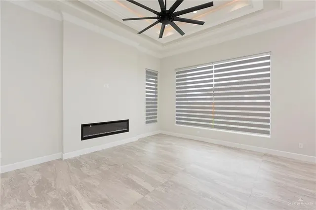 a view of kitchen with a sink stainless steel appliances and cabinets