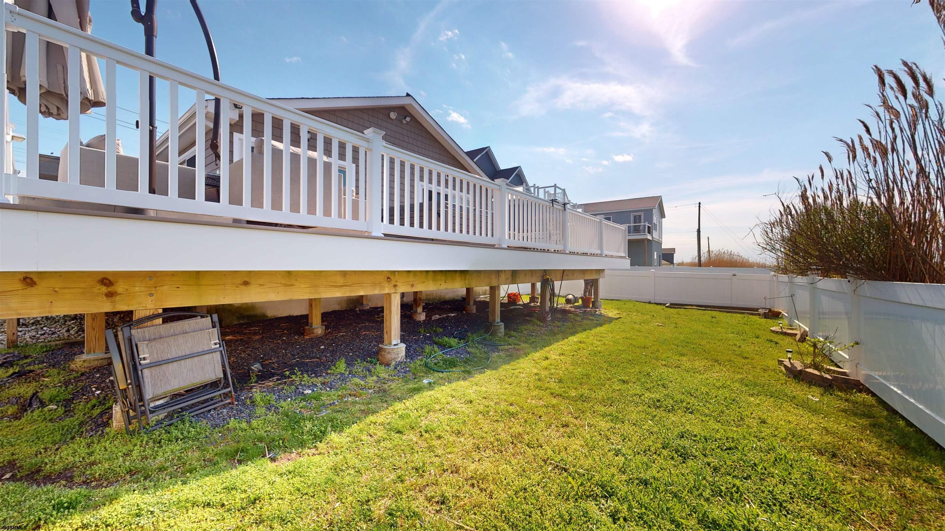 4205 Atlantic Brigantine Boulevard Brigantine, NJ 08203 - Photo 25 of 58 a swimming pool with outdoor seating and yard