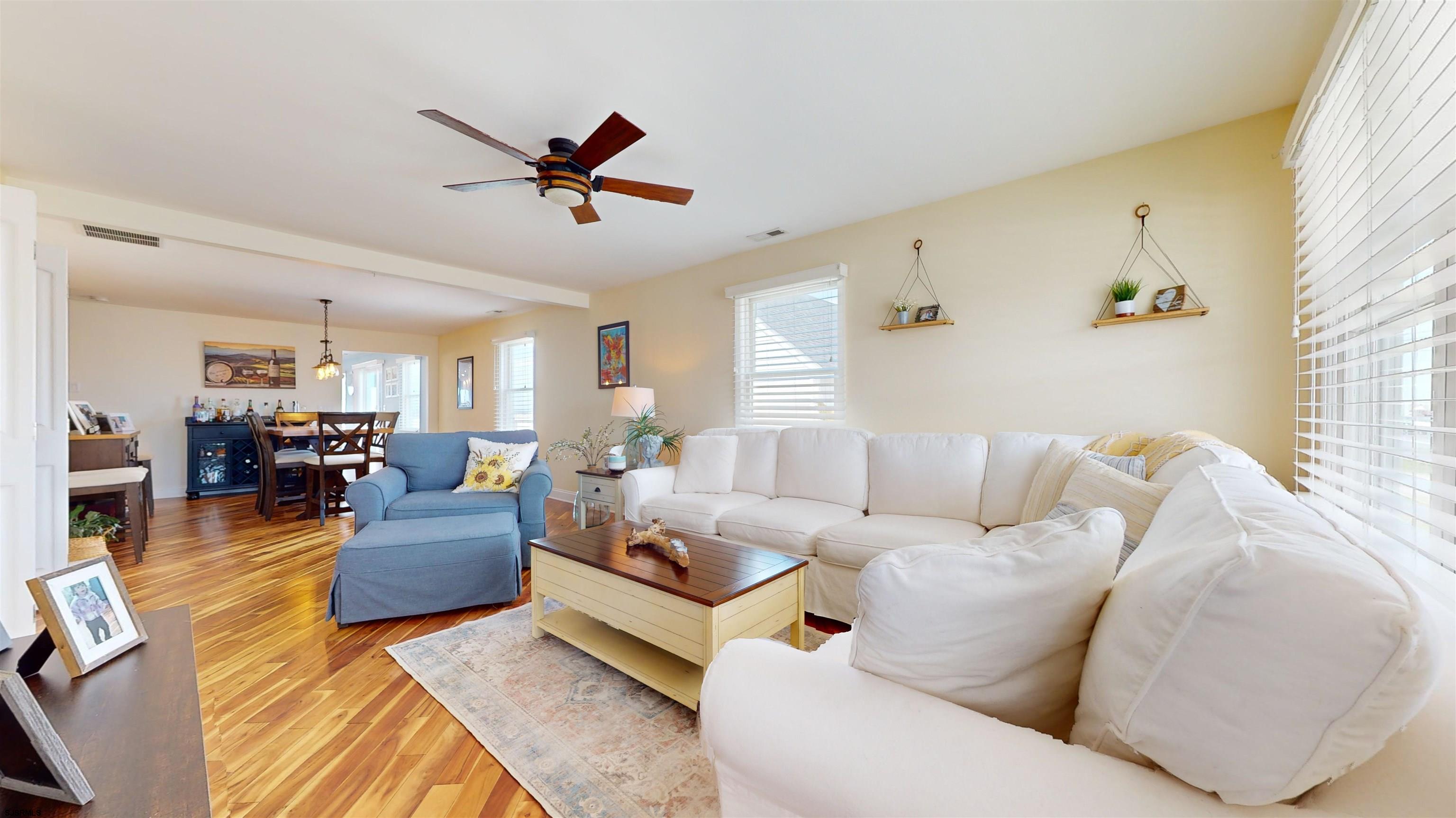4205 Atlantic Brigantine Boulevard Brigantine, NJ 08203 - Photo 46 of 58 a living room with furniture kitchen view and a large window